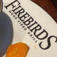 Photo taken at Firebirds Wood Fired Grill by Tom K. on 1/9/2021
