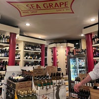 Photo taken at Sea Grape Wine Shop by Sara S. on 5/23/2022