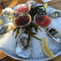 Photo taken at The Oyster Club by Kellogg F. on 8/7/2015