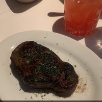 Photo taken at New York Prime Steakhouse by Kaley I. on 3/27/2022