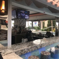 Photo taken at H2o Pool + Bar at The San Luis Resort by Linton W. on 1/30/2019