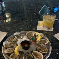 Photo taken at Joe Fish Seafood Restaurant and Bar by Carmen P. on 8/28/2022