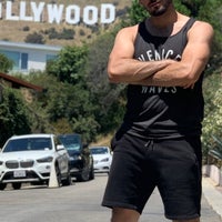 Photo taken at Hollywood Sign - Beachwood Canyon Trail by Khalid A. on 5/13/2021