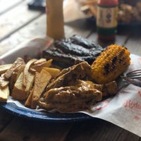 Photo taken at Redneck Wings Ribs and Beer by Christian D. on 11/29/2019