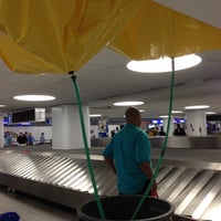 Photo taken at Terminal 1 Baggage Claim by Chris M. on 5/11/2013