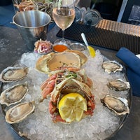 Photo taken at Taylor Shellfish Oyster Bar by Leslie F. on 7/5/2023