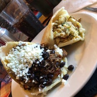 Photo taken at Arepas Cafe by Jesse B. on 12/2/2019