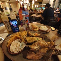 Photo taken at Nando&amp;#39;s by abbie lim on 1/24/2020