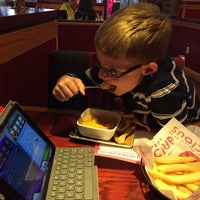 Photo taken at Red Robin Gourmet Burgers and Brews by Carol B. on 10/7/2015