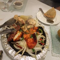 Photo taken at Basmati Indian Cuisine by John M. on 6/24/2014