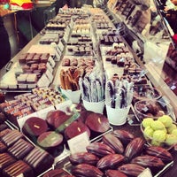 Photo taken at Chocolat Michel Cluizel by Cody B. on 12/8/2012
