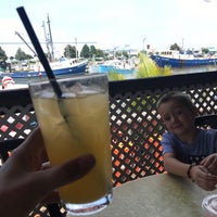 Photo taken at Harborside Bar &amp;amp; Grill by Michael S. on 6/17/2019