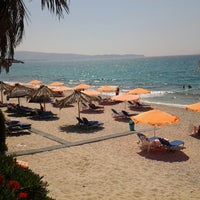 Photo taken at Stelakis Beach by Panos K. on 7/20/2014
