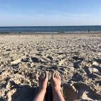 Photo taken at Grande Plage by Sinead D. on 9/2/2018