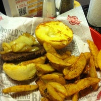 Photo taken at Fuddruckers by Lucy C. on 5/27/2013