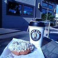 Photo taken at Top Pot Doughnuts by Marcela A. on 7/4/2014