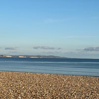 Photo taken at Lyme Regis Beach by Martina S. on 10/10/2021