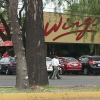 Photo taken at Wings by Mauricio D. on 6/8/2012
