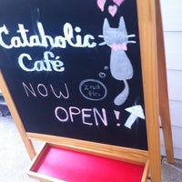 Photo taken at Cataholic Café by A S. on 4/28/2013