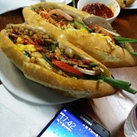 Photo taken at Bánh Mì Phượng by Christy P. on 11/21/2014