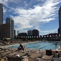 Photo taken at East Bank Club Pool Deck by M &amp;amp; M. on 7/24/2013