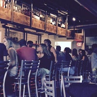 Photo taken at Slake Cafe &amp;amp; Bar by Alex M. on 8/14/2015