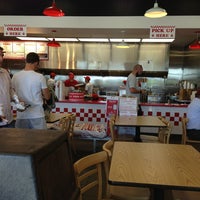 Photo taken at Five Guys by Riley C. on 3/24/2013