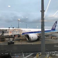Photo taken at Gate 52 by 黒川 理. on 3/22/2018