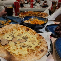 Photo taken at 8portions Pizza by A on 5/18/2024