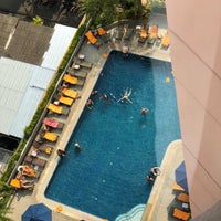 Photo taken at swimming pool @ rembrandt hotel by Nick on 4/16/2018