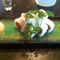 Photo taken at Rise Sushi Lounge by Laura G. on 4/21/2012