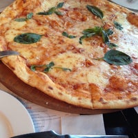 Photo taken at Pizza Mizza by Pibi on 2/7/2015