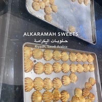 Photo taken at Al Karamah Sweets by NA on 9/28/2023