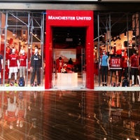Photo taken at Manchester United Shop by Kamarul A. on 10/27/2013