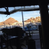 Photo taken at Solomon&amp;#39;s Landing Los Cabos by j r. on 5/14/2013