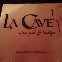 Photo taken at La Cave Wine Bar &amp;amp; Boutique by Jay P. on 7/22/2013