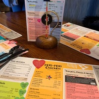 Photo taken at Nando&amp;#39;s by Bia P. on 12/26/2019