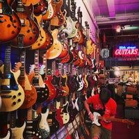 Photo taken at 30th Street Guitars by Nathaniel G. on 4/9/2013