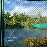 Photo taken at Krungthon Tennis Court by Viput A. on 8/14/2013