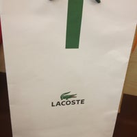 Photo taken at Lacoste by Christina A. on 7/20/2013