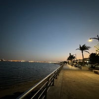 Photo taken at Al-Hamra Corniche by E🖤🐆 on 3/27/2024