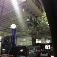 Photo taken at Express Oil Change &amp;amp; Tire Engineers by Samantha J. on 2/20/2013