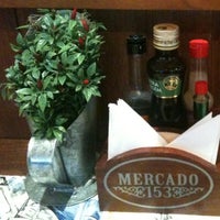 Photo taken at Mercado 153 by Luciana M. on 6/29/2012