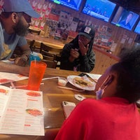 Photo taken at Hooters by Christiana D. on 10/4/2022