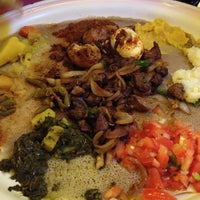 Photo taken at Meskerem Ethiopian Restaurant by Sarah H. on 6/26/2013