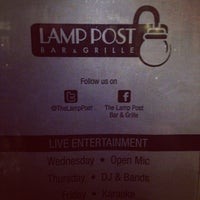 Photo taken at Lamp Post Bar &amp;amp; Grille by Matthew L. on 4/4/2014
