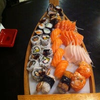 Photo taken at Sushi Take by Viviane G. on 9/26/2012