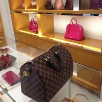 Photo taken at Louis Vuitton by Валентина К. on 7/26/2013
