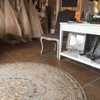 Photo taken at Wedding Angels Bridal Boutique by Molly E. on 3/5/2018