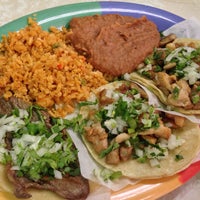 Photo taken at Taqueria Los Comales Logan Square by Leah J. on 7/3/2013